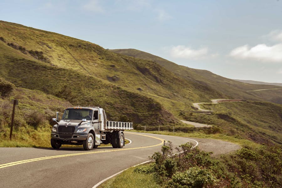 A truck driving on a winding road