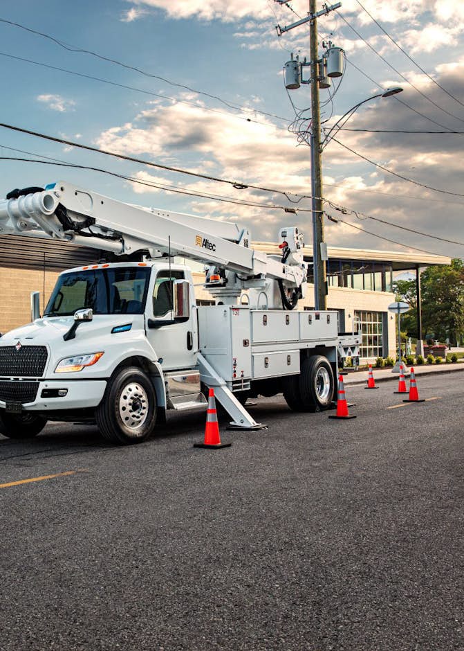 International truck parked under power lines