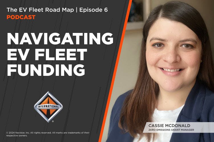 A person smiling and a poster