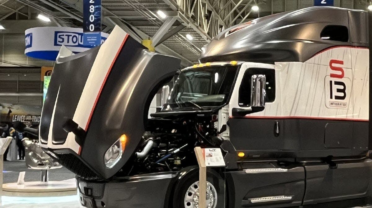 A truck with the hood open