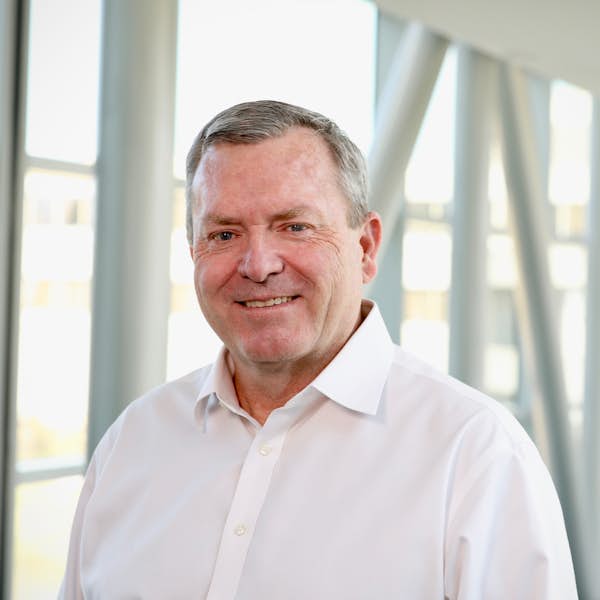 A person wearing a white shirt