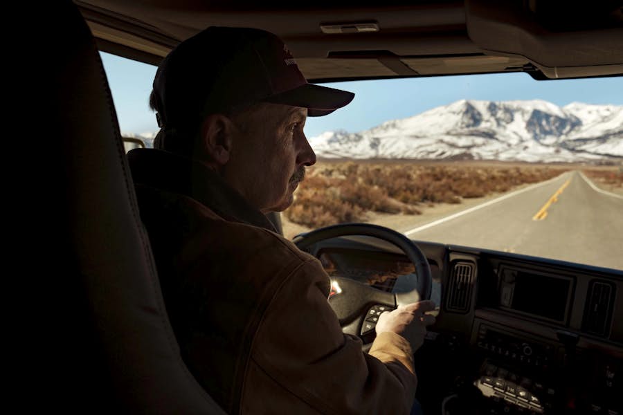 A person driving a car