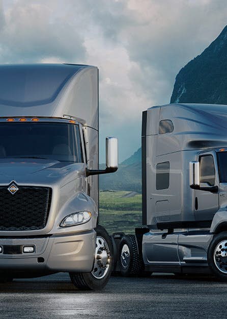 International trucks parked in front of solar field