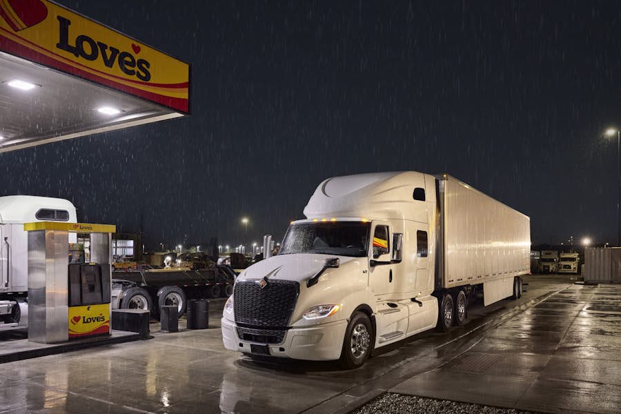 A truck at a gas station