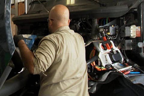 A person working on a car